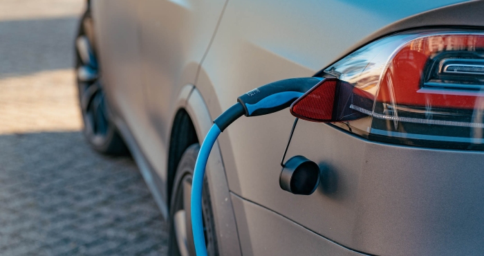 Bidirectional Smart Charging for Plug-In Mass Electromobility with the Innovative Concept DriVe2X